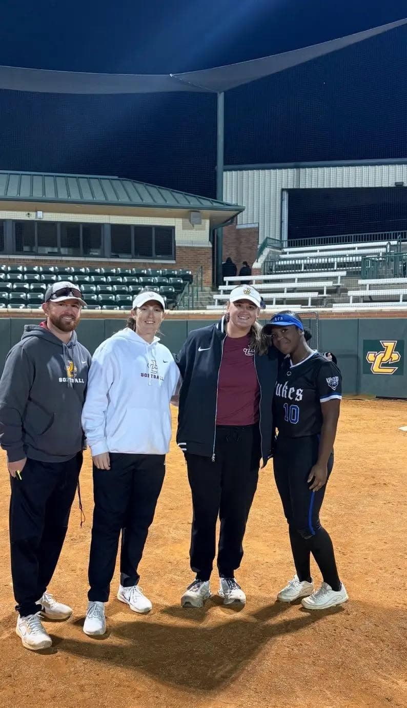 Kennedi Fair with college coaches at the Jones Softball Camp, Louisiana Christian University.